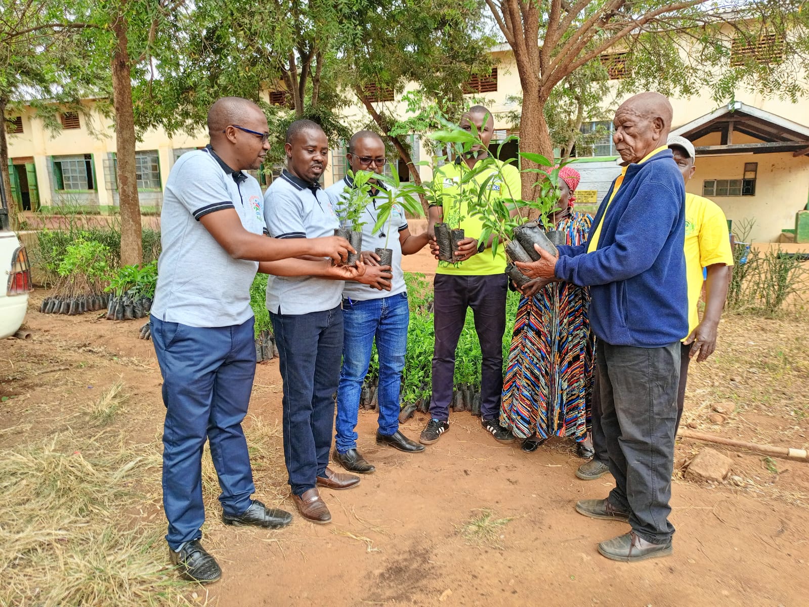 Eco-champions planting trees in urban spaces